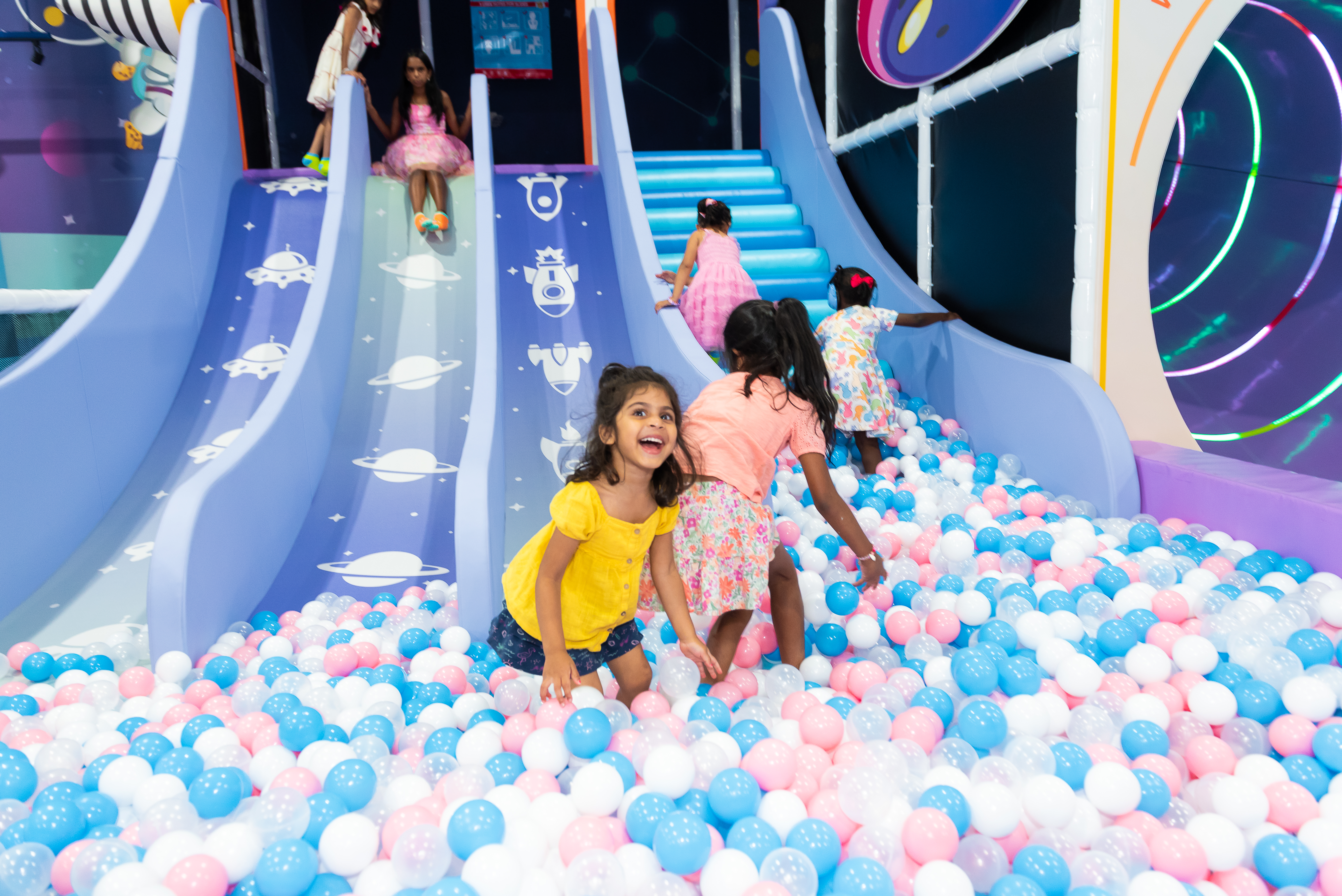 Kids playing in the ball pit at Hyper Kidz indoor playground